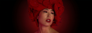 Commercial hair & makeup artist Sydney: Hunter magazine editorial spread with a sculptural red rose headpiece and a bold red lip